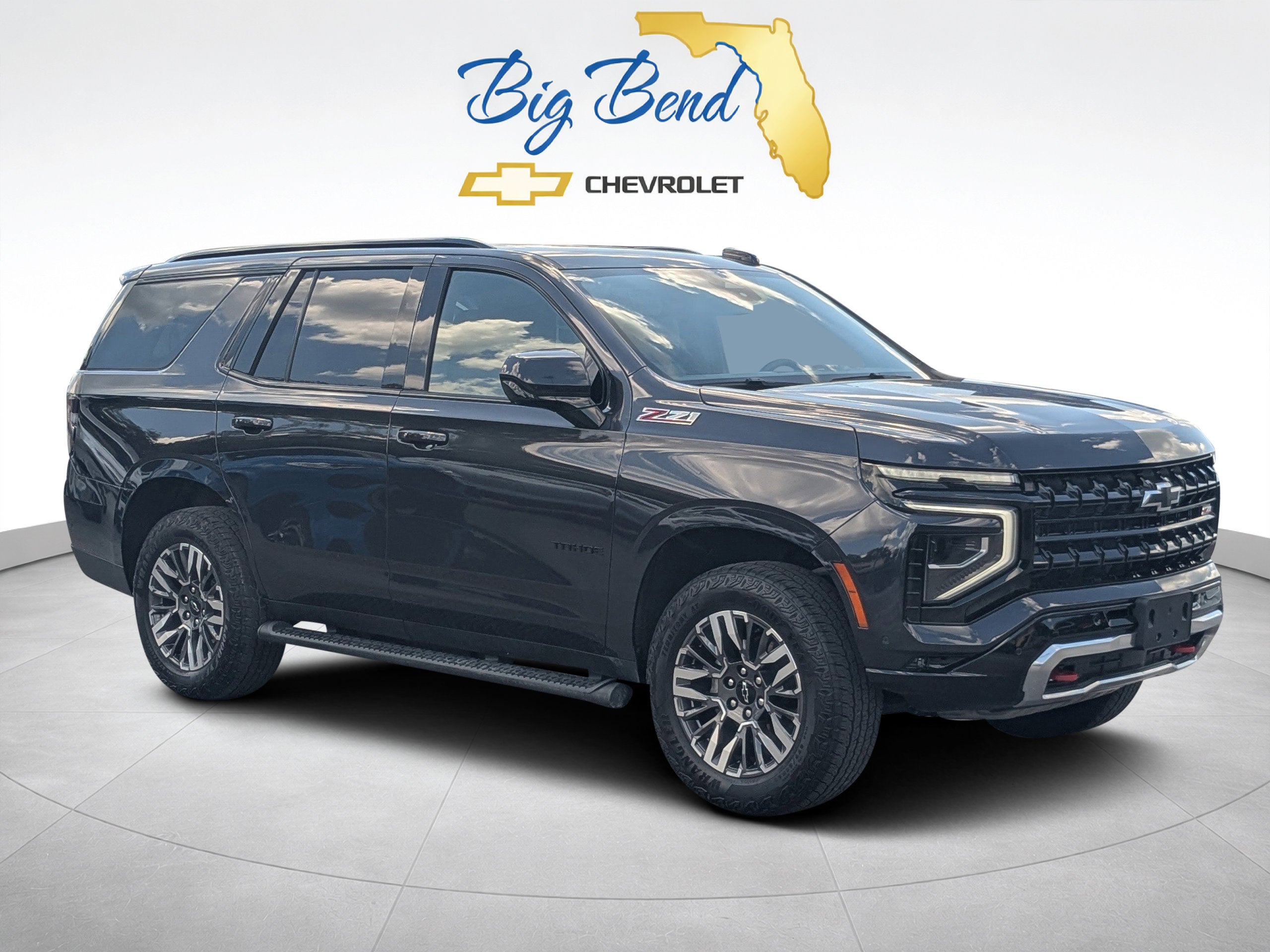 2025 Chevrolet Tahoe Z71 in Dark Ash Metallic — front three-quarter view