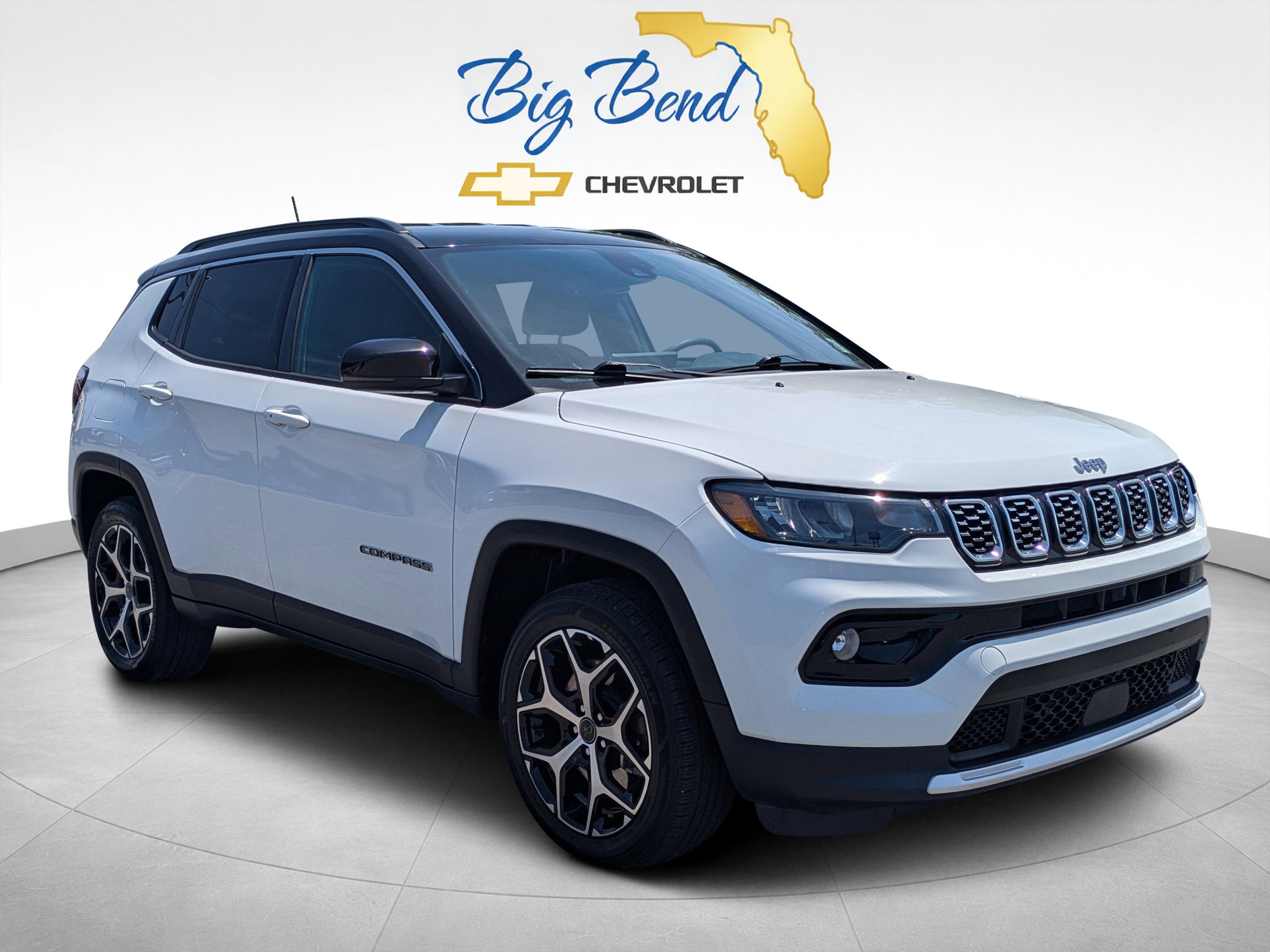 2025 Jeep Compass Limited 4x4 in White — front three-quarter view