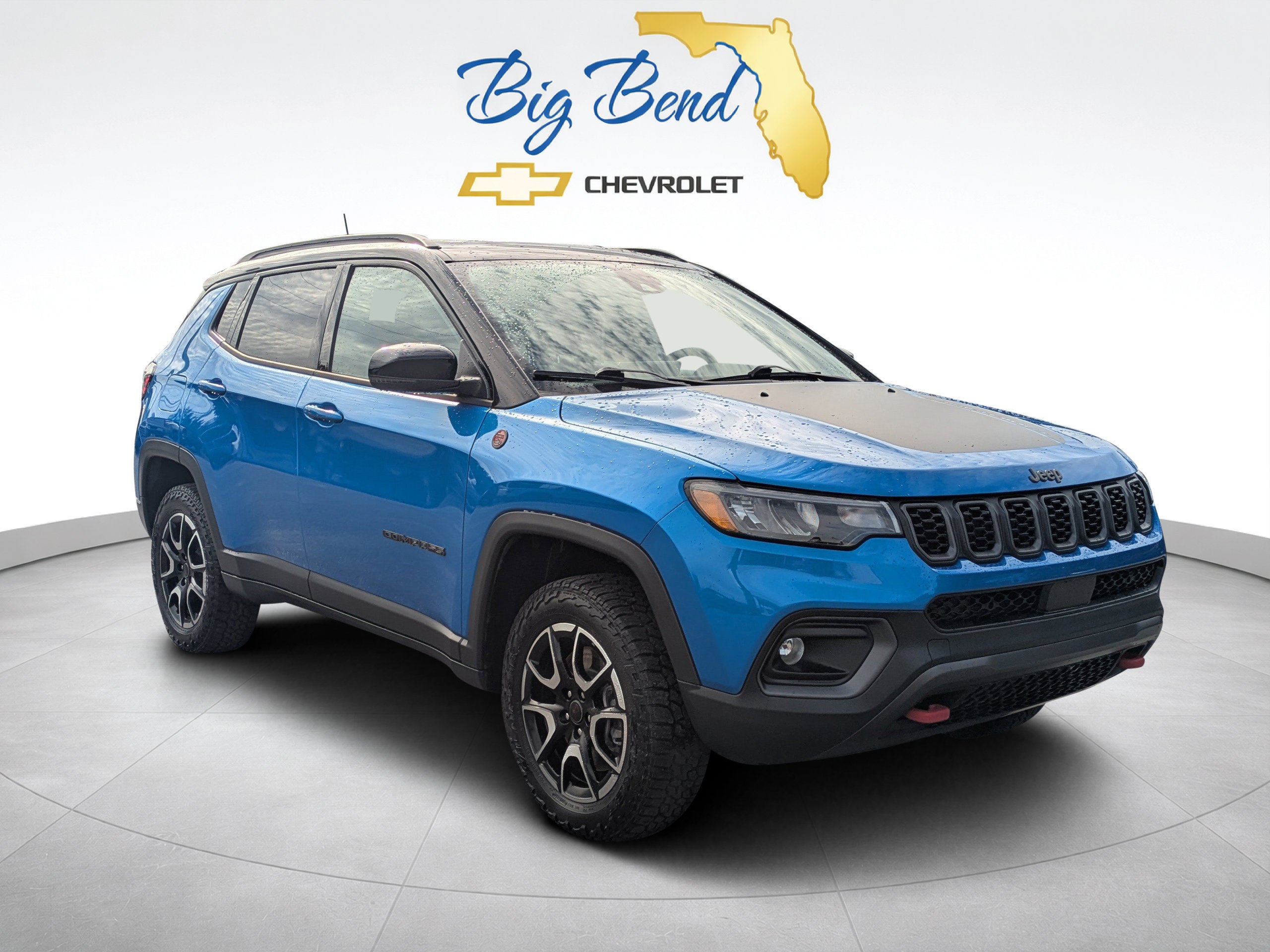 2025 Jeep Compass Trailhawk 4x4 in Blue — front three-quarter view