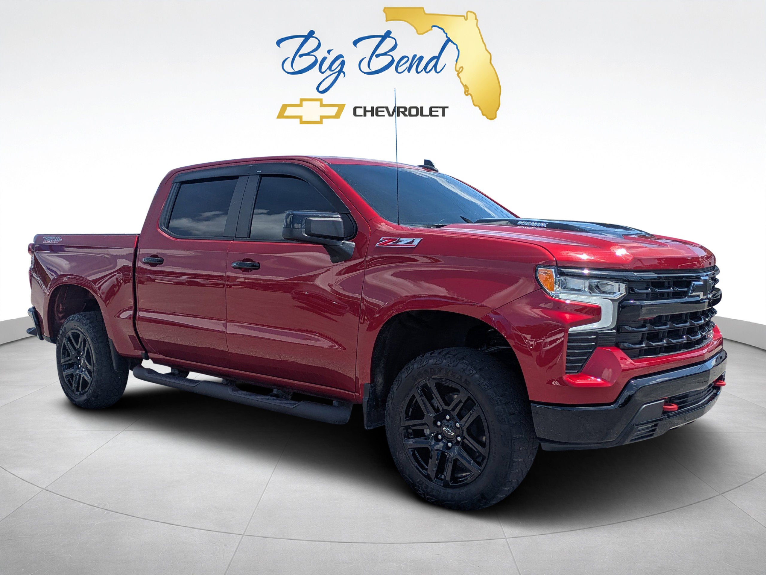 2024 Chevrolet Silverado 1500 LT Trail Boss in Radiant Red Tintcoat — front three-quarter view